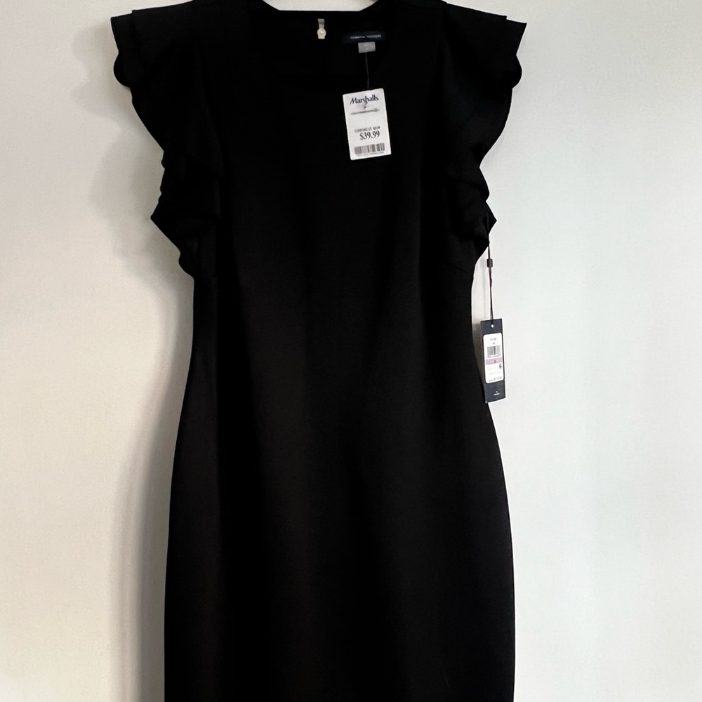 NWT cocktail dress. Black. With fringe design. Size 6
